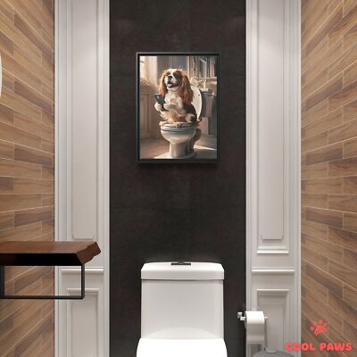King Charles Spaniel on the Toilet with a Smartphone
