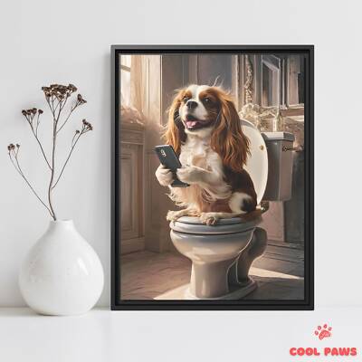 King Charles Spaniel on the Toilet with a Smartphone