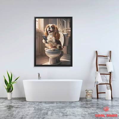 King Charles Spaniel on the Toilet with a Smartphone