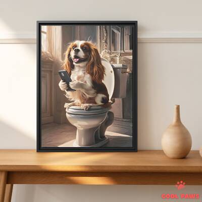King Charles Spaniel on the Toilet with a Smartphone