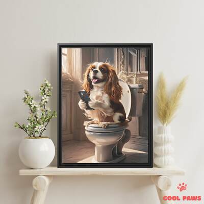 King Charles Spaniel on the Toilet with a Smartphone